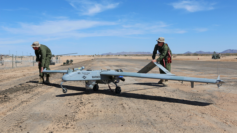 Marines prep an RQ-7Bv2 Shadow unmanned aerial system for launch. Source: Lance Cpl. Harley Robinson via The United States Marine Corps.
